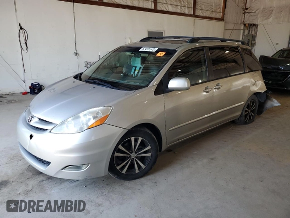 2010 Toyota Sienna XLE with VIN 5TDYK4CCXAS323450, listed as a Copart auction lot 62491545 with 220,121 mi miles and Salvage title. Bid and sale history available at DreamBid. Image 1.