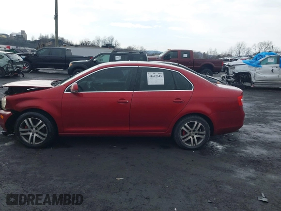 2006 Volkswagen Jetta 2.5L z VIN 3VWSF71KX6M681223, wystawiony jako IAAI lot #41645643 z przebiegiem 72 631 mil mil oraz . Historia ofert i sprzedaży dostępna na DreamBid. Obrazek 14.