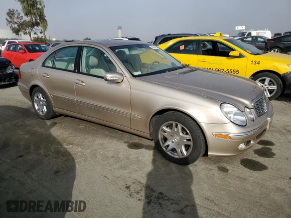 2003 Mercedes-Benz E-Class 3.2L with VIN WDBUF65J93A115990, listed as a Copart auction lot 43059615 with 39,025 mi miles and Salvage Title. Bid and sale history available at carsss.com. Image 4.