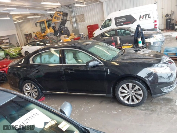2015 Lincoln MKS with VIN 1LNHL9DK9FG604085, listed as a IAAI auction lot 41251811 with 58502 miles. Bid and sale history available at carsss.com. Image 14.