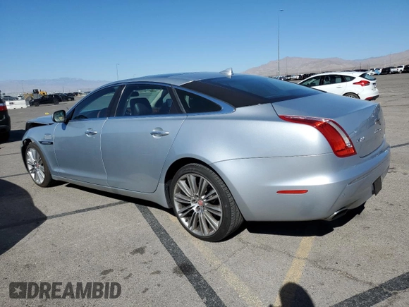 2015 Jaguar XJ with VIN SAJWA2GZ4F8V90853, listed as a Copart auction lot 72631114 with 59,237 mi miles and Salvage Title. Bid and sale history available at carsss.com. Image 2.
