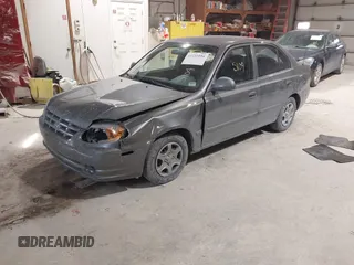 2004 Hyundai Accent GL with VIN KMHCG45C44U528783, listed as a IAAI auction lot 41535104 with 1 mi miles. Bid and sale history available at carsss.com. Image 17.