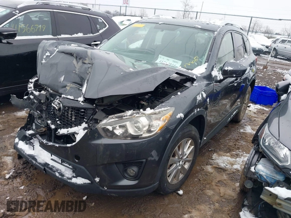 2014 Mazda CX-5 Touring with VIN JM3KE2CY2E0407453, listed as a IAAI auction lot 41564916 with 104,852 mi miles. Bid and sale history available at carsss.com. Image 16.