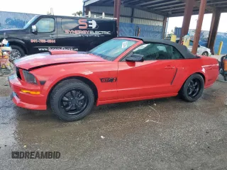 2009 Ford Mustang GT with VIN 1ZVHT85H695111656, listed as a Copart auction lot 72263244 with 87,954 mi miles and Salvage title. Bid and sale history available at DreamBid. Image 1.
