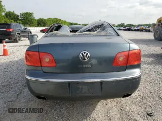 2004 Volkswagen Phaeton V8 z VIN WVWAF63D848010657, wystawiony jako Copart lot #56595145 z przebiegiem 192 013 mil mil oraz Szkoda całkowita • Salvage title. Historia ofert i sprzedaży dostępna na DreamBid. Obrazek 6.