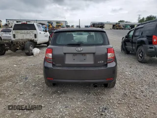 2009 Scion xD with VIN JTKKU10499J045881, listed as a Copart auction lot 60923855 with 125,762 mi miles and Salvage title. Bid and sale history available at DreamBid. Image 6.