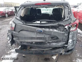 2017 Ford Escape SE with VIN 1FMCU9G99HUE78637, listed as a IAAI auction lot 41152042 with 84,635 mi miles. Bid and sale history available at carsss.com. Image 6.