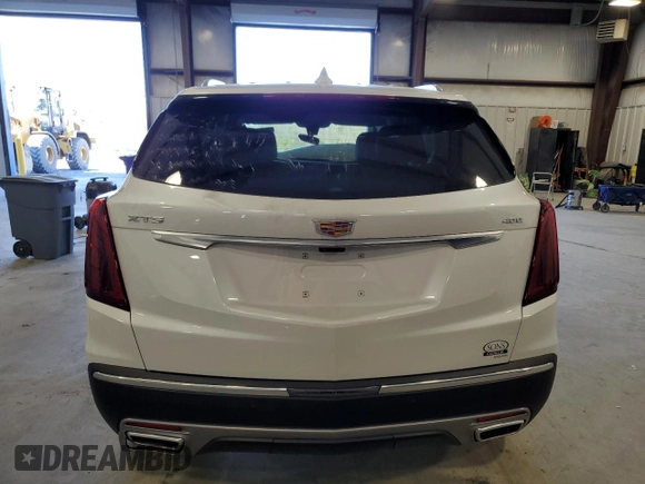 2025 Cadillac XT5 FWD Premium Luxury with VIN 1GYKNCRSXSZ106707, listed as a Copart auction lot 86919854 with 1,879 mi miles and Salvage Title. Bid and sale history available at DreamBid. Image 6.