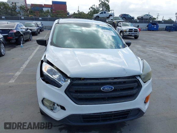 2018 Ford Escape S z VIN 1FMCU0F78JUA56974, wystawiony jako IAAI lot #42232294 z przebiegiem 63 511 mil mil oraz . Historia ofert i sprzedaży dostępna na DreamBid. Obrazek 6.