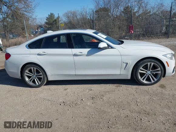 2016 BMW 4 Series 428i xDrive with VIN WBA4C9C59GG138090, listed as a IAAI auction lot 41560267 with 94,010 mi miles and . Bid and sale history available at carsss.com. Image 13.