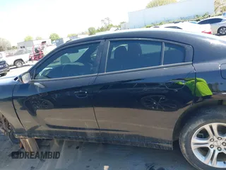 2019 Dodge Charger SXT with VIN 2C3CDXBG5KH713354, listed as a IAAI auction lot 41880772 with 133,408 mi miles. Bid and sale history available at carsss.com. Image 15.