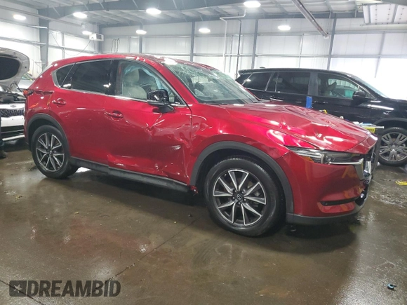 2018 Mazda CX-5 Grand Touring with VIN JM3KFBDM5J0454026, listed as a Copart auction lot 60672315 with 12,292 mi miles and Salvage title. Bid and sale history available at DreamBid. Image 4.