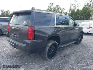 2018 Chevrolet Tahoe LT with VIN 1GNSCBKCXJR256508, listed as a IAAI auction lot 41472837 with 92,203 mi miles. Bid and sale history available at carsss.com. Image 4.