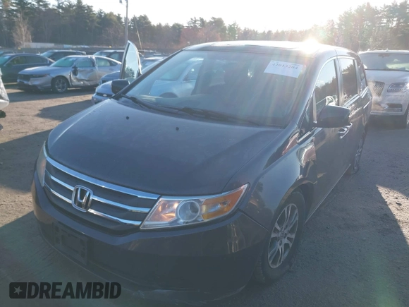 2013 Honda Odyssey EX-L with VIN 5FNRL5H64DB034860, listed as a IAAI auction lot 42013204 with 104,314 mi miles and . Bid and sale history available at carsss.com. Image 2.