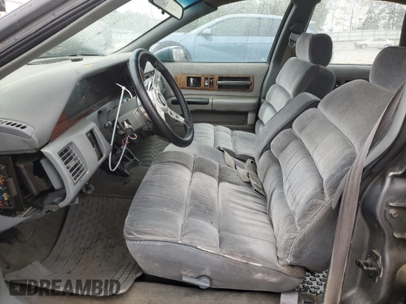 1991 Chevrolet Caprice z VIN 1G1BN53E1MW223013, wystawiony jako Copart lot #49857604 z przebiegiem 224 278 mil mil oraz Szkoda całkowita • Salvage title. Historia ofert i sprzedaży dostępna na DreamBid. Obrazek 7.