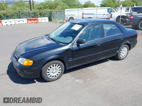 1999 Mazda Protege DX z VIN JM1BJ2228X0108327, wystawiony jako IAAI lot #41630708 z przebiegiem 171 459 mil mil oraz . Historia ofert i sprzedaży dostępna na DreamBid. Obrazek 2.