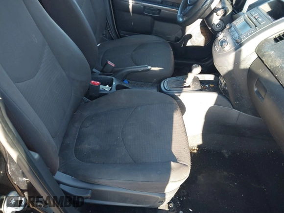 2012 Kia Soul with VIN KNDJT2A5XC7477841, listed as a IAAI auction lot 41882250 with 175,236 mi miles. Bid and sale history available at carsss.com. Image 5.
