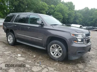 2018 Chevrolet Tahoe LT with VIN 1GNSKBKC8JR268689, listed as a Copart auction lot 58199955 with 131,906 mi miles and Salvage title. Bid and sale history available at DreamBid. Image 4.