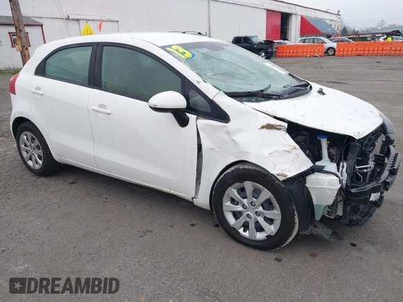 2013 Kia Rio LX with VIN KNADM5A34D6110013, listed as a IAAI auction lot 41306019 with 80,501 mi miles and . Bid and sale history available at DreamBid. Image 1.