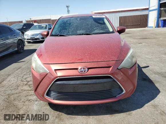 2016 Scion iA z VIN 3MYDLBZV3GY122064, wystawiony jako Copart lot #57616435 z przebiegiem 100 556 mil mil oraz Szkoda całkowita • Salvage title. Historia ofert i sprzedaży dostępna na DreamBid. Obrazek 5.