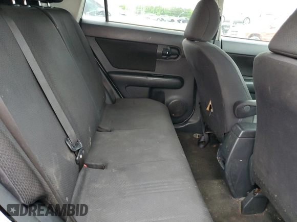 2009 Scion xB z VIN JTLKE50E591067708, wystawiony jako Copart lot #56297005 z przebiegiem 206 638 mil mil oraz Szkoda całkowita • Salvage title. Historia ofert i sprzedaży dostępna na DreamBid. Obrazek 10.