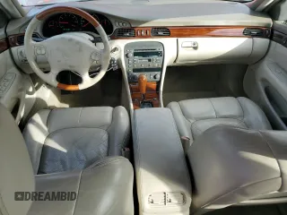 1999 Cadillac Seville Touring STS z VIN 1G6KY5490XU919543, wystawiony jako Copart lot #77068624 z przebiegiem 142 772 mil mil oraz Szkoda całkowita • Salvage title. Historia ofert i sprzedaży dostępna na DreamBid. Obrazek 8.