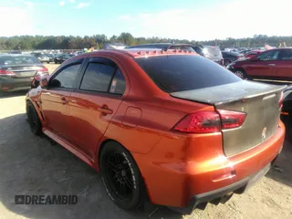 2010 Mitsubishi Lancer Evolution GSR with VIN JA32W8FV7AU003558, listed as a IAAI auction lot 40856259 with 123,639 mi miles and . Bid and sale history available at DreamBid. Image 3.