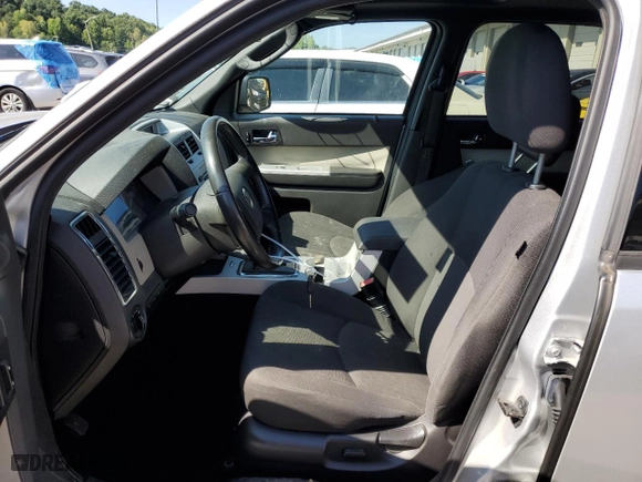 2011 Mercury Mariner with VIN 4M2CN9BG7BKJ06587, listed as a Copart auction lot 85033504 with 115,105 mi miles and Non Repairable. Bid and sale history available at carsss.com. Image 7.
