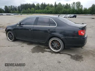 2007 Volkswagen Jetta Wolfsburg Edition z VIN 3VWEF71K67M061788, wystawiony jako Copart lot #57208365 z przebiegiem 184 055 mil mil oraz Szkoda całkowita • Salvage title. Historia ofert i sprzedaży dostępna na DreamBid. Obrazek 2.