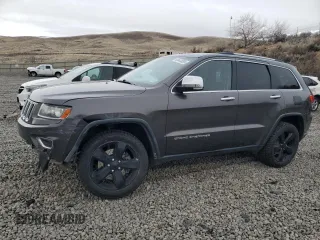 2014 Jeep Grand Cherokee Limited z VIN 1C4RJFBGXEC134974, wystawiony jako Copart lot #53508355 z przebiegiem 152 231 mil mil oraz Szkoda całkowita • Salvage title. Historia ofert i sprzedaży dostępna na DreamBid. Obrazek 1.
