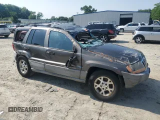 1999 Jeep Grand Cherokee Laredo с VIN 1J4G258S9XC758711, выставлен на аукционе Copart как лот 58420835 с пробегом Не указан миль и Списание • Salvage title. История ставок и продаж доступна на DreamBid. Изображение 4.