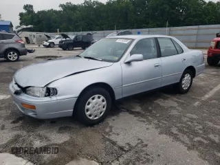 1996 Toyota Camry DX with VIN 4T1BG12K6TU806801, listed as a Copart auction lot 59742005 with 194,812 mi miles and Salvage title. Bid and sale history available at DreamBid. Image 1.