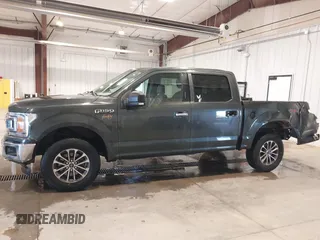 2018 Ford F-150 XL with VIN 1FTEW1EG3JKE52823, listed as a IAAI auction lot 41413009 with 142,057 mi miles. Bid and sale history available at carsss.com. Image 14.