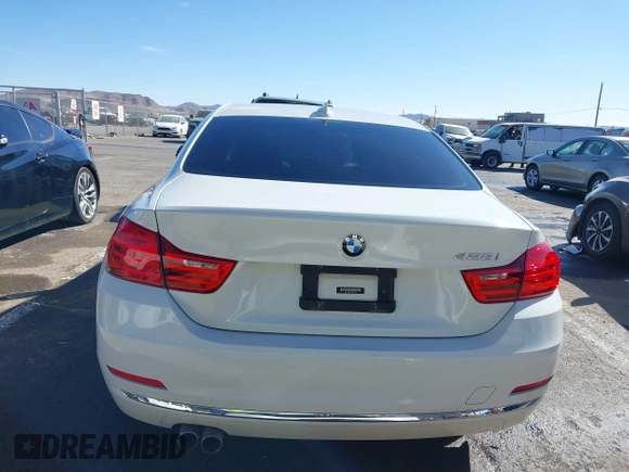 2015 BMW 4 Series 428i with VIN WBA3N3C51FK232902, listed as a IAAI auction lot 41547137 with 136,306 mi miles and . Bid and sale history available at DreamBid. Image 16.