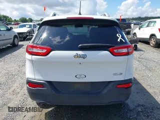 2018 Jeep Cherokee Latitude with VIN 1C4PJLCB1JD553390, listed as a IAAI auction lot 42233220 with 130,418 mi miles and . Bid and sale history available at DreamBid. Image 16.