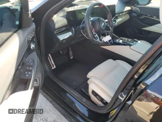 2024 BMW i5 M60 z VIN WBY43FK00RCP12947, wystawiony jako Copart lot #73754024 z przebiegiem Nie podano mil oraz Szkody całkowita. Historia ofert i sprzedaży dostępna na DreamBid. Obrazek 8.