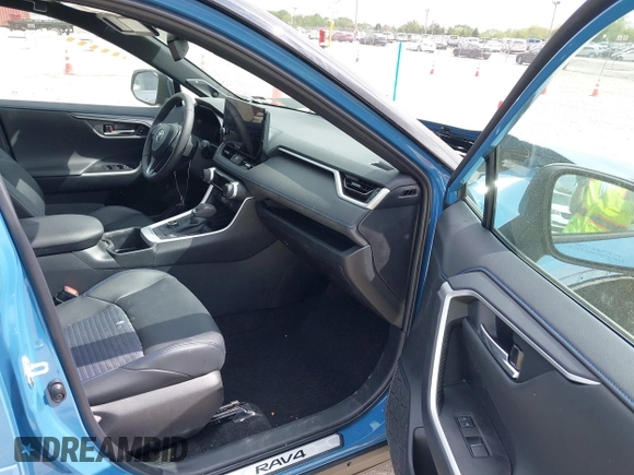 2024 Toyota RAV4 Hybrid XSE with VIN 4T3E6RFV4RU163271, listed as a IAAI auction lot 42237047 with 9,988 mi miles and . Bid and sale history available at DreamBid. Image 5.