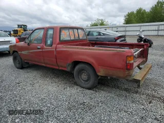1992 Toyota Pickup DLX z VIN JT4RN93P4N5064218, wystawiony jako Copart lot #58095635 z przebiegiem 256 271 mil mil oraz Tytuł czysty. Historia ofert i sprzedaży dostępna na DreamBid. Obrazek 2.