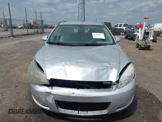 2009 Chevrolet Impala LT with VIN 2G1WT57K991228661, listed as a IAAI auction lot 42001074 with 104,918 mi miles and . Bid and sale history available at DreamBid. Image 12.