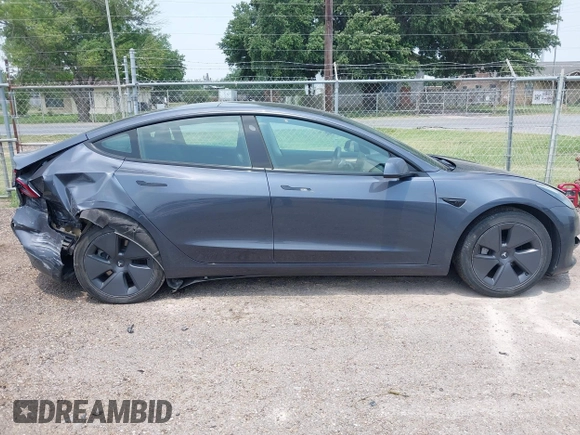 2023 Tesla Model 3 with VIN 5YJ3E1EA7PF409243, listed as a IAAI auction lot 42305360 with Not provided miles and . Bid and sale history available at DreamBid. Image 13.