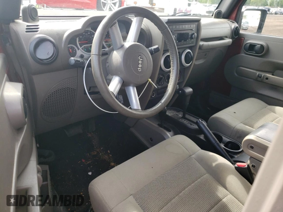 2008 Jeep Wrangler Sahara with VIN 1J4FA54178L566037, listed as a Copart auction lot 61439685 with 115,812 mi miles and Salvage title. Bid and sale history available at DreamBid. Image 8.