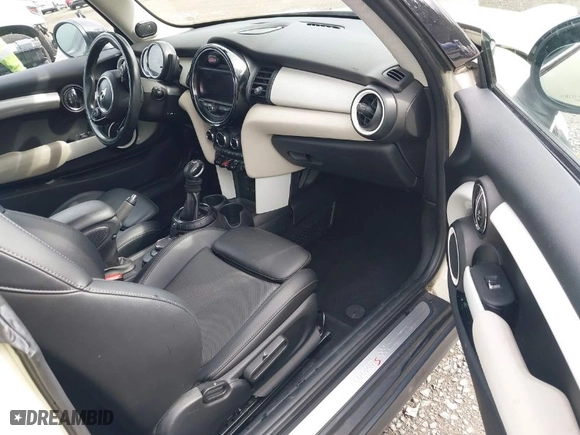 2016 MINI Cooper Hardtop S with VIN WMWXP7C59G2A42935, listed as a IAAI auction lot 41910245 with 106,154 mi miles. Bid and sale history available at carsss.com. Image 5.