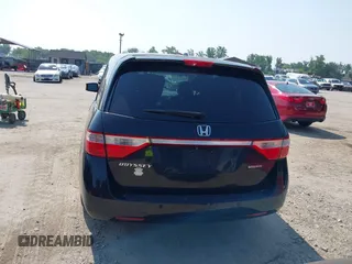 2011 Honda Odyssey Touring with VIN 5FNRL5H97BB073708, listed as a IAAI auction lot 42409164 with 141,986 mi miles and . Bid and sale history available at DreamBid. Image 16.