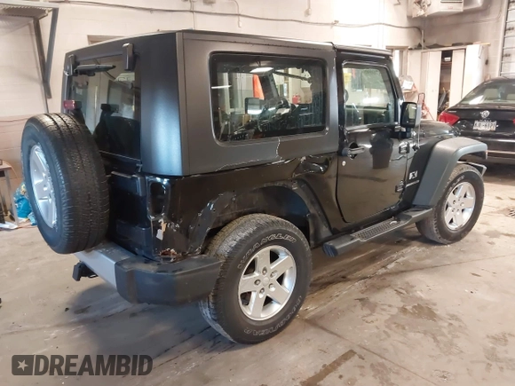 2007 Jeep Wrangler X with VIN 1J8FA24167L230763, listed as a IAAI auction lot 41876090 with 130,136 mi miles and . Bid and sale history available at carsss.com. Image 4.