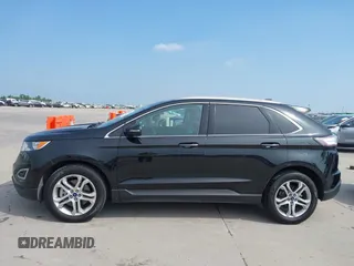 2015 Ford Edge Titanium z VIN 2FMTK3K87FBC06852, wystawiony jako IAAI lot #42335238 z przebiegiem 187 256 mil mil oraz . Historia ofert i sprzedaży dostępna na DreamBid. Obrazek 14.