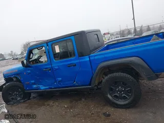 2022 Jeep Gladiator Mojave with VIN 1C6JJTEG1NL128530, listed as a IAAI auction lot 41111344 with 56,119 mi miles. Bid and sale history available at carsss.com. Image 14.