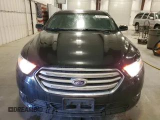 2014 Ford Taurus SEL z VIN 1FAHP2E82EG186640, wystawiony jako Copart lot #55820205 z przebiegiem 194 843 mil mil oraz Czysty tytuł • Clean title. Historia ofert i sprzedaży dostępna na DreamBid. Obrazek 5.