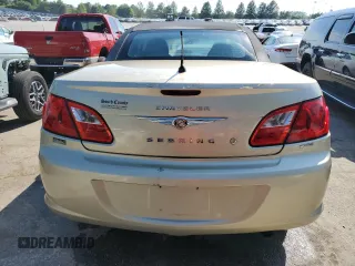 2010 Chrysler Sebring Touring z VIN 1C3BC5ED8AN166543, wystawiony jako Copart lot #56316984 z przebiegiem 78 655 mil mil oraz Szkody całkowita. Historia ofert i sprzedaży dostępna na DreamBid. Obrazek 6.