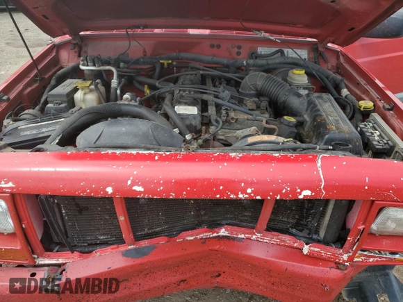 1999 Jeep Cherokee Sport with VIN 1J4FF68S4XL580048, listed as a Copart auction lot 62546365 with 154,059 mi miles and Clean title. Bid and sale history available at DreamBid. Image 12.