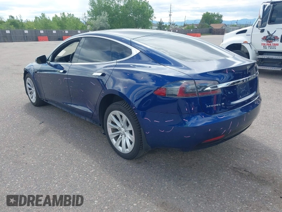 2016 Tesla Model S 70 with VIN 5YJSA1E18GF174200, listed as a IAAI auction lot 42274415 with 65,231 mi miles and . Bid and sale history available at DreamBid. Image 3.